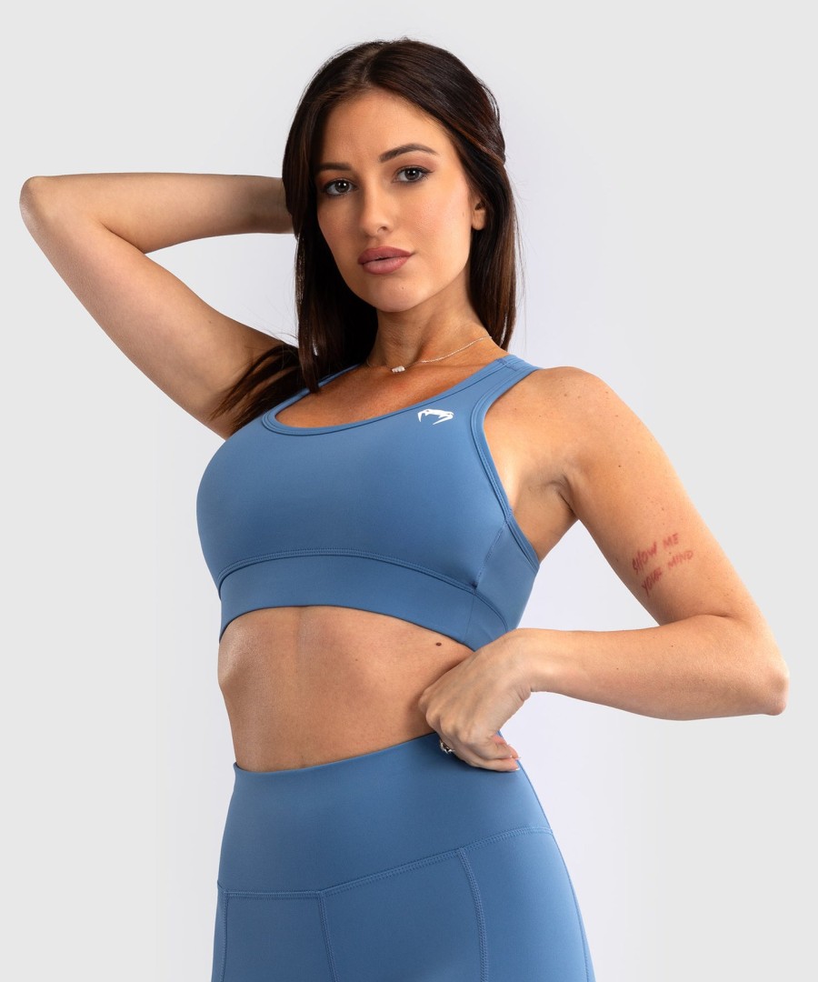 venum essential women medium impact sports bra - storm blue