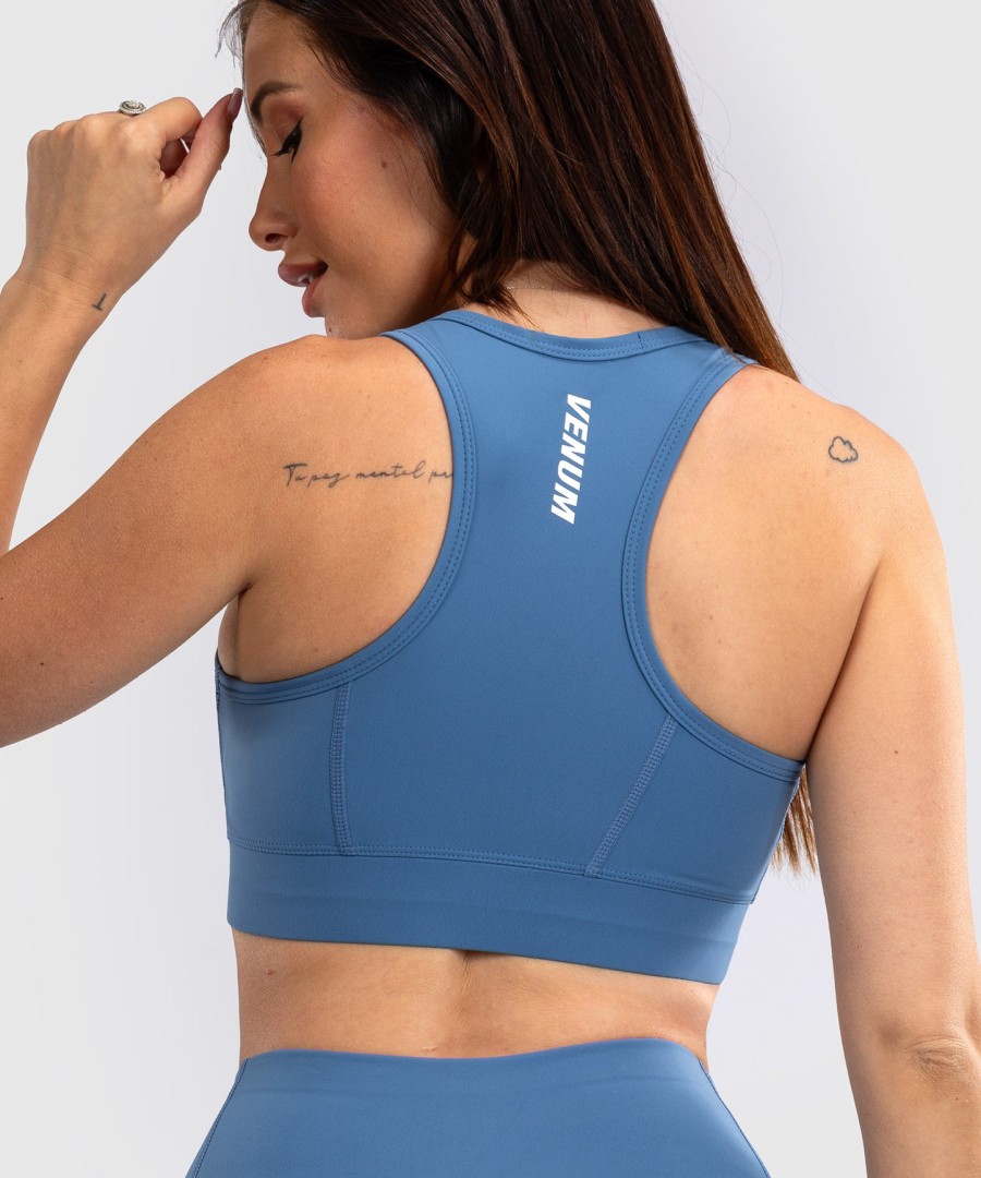 venum essential women medium impact sports bra - storm blue