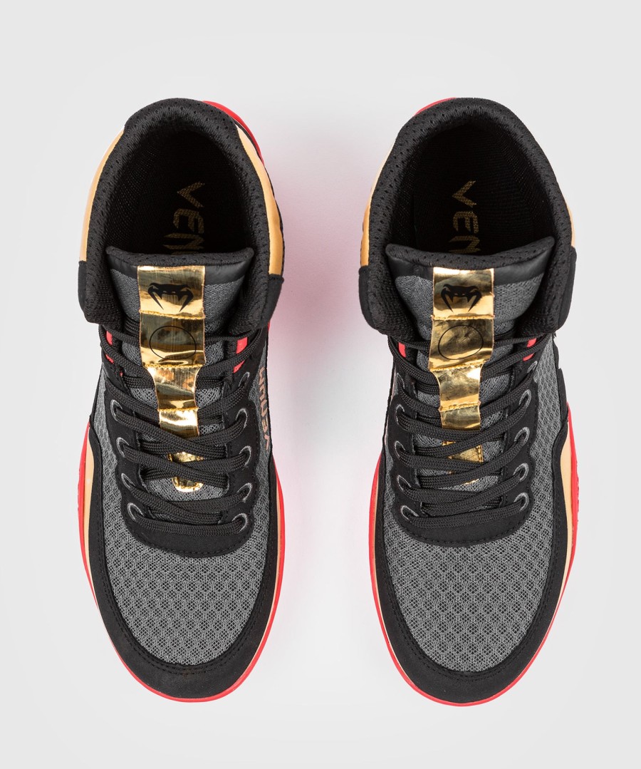 venum elite wrestling shoes - blackgoldred